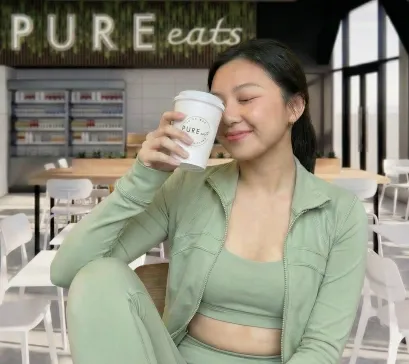 Woman drink from pure eats